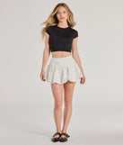 The Darling Allure Drop Waist Bubble Hem Woven Skort is a trendy women's bottom in ivory, designed with modern details and alluring textures to complete chic outfits for 2025.
