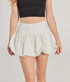 Create bold, fashion-forward looks for summer with the Darling Allure Drop Waist Bubble Hem Woven Skort in ivory, a must-have piece from Windsor’s collection of stylish bottoms for women.