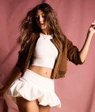 The Darling Allure Drop Waist Bubble Hem Woven Skort is a trendy women's bottom, designed with modern details and alluring textures to complete chic outfits for 2025.