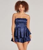 With its easy fit and flirty cut, the Irresistible Darling Strapless Tie Waist Satin Romper is a navy blue one-piece that brings fun, freedom, and movement to your weekend look.