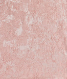 The Enchanting Chic Floral Jacquard Skater Romper is a mauve dress, an essential holiday or NYE dress that pairs chic style with versatility making it perfect for cocktail events, New Year's Eve parties, or as a winter wedding guest look.