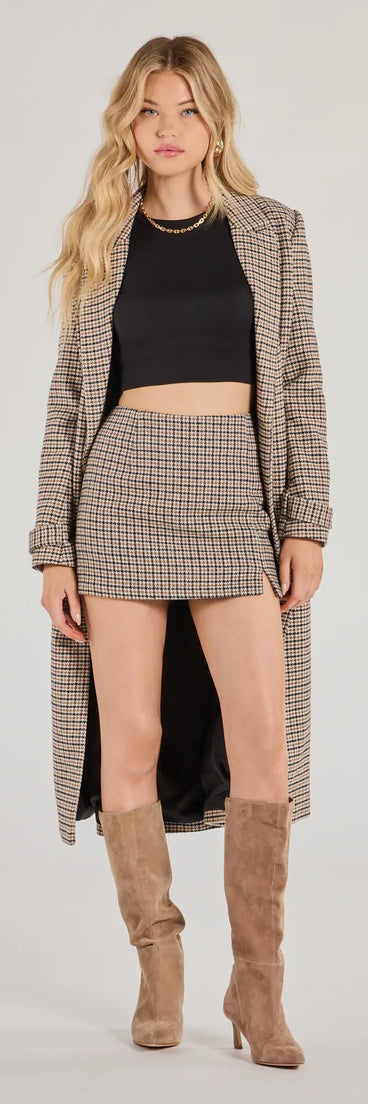Effortlessly create party outfits or vacation-ready looks with the Plaid Perfection Faux Wool Mini Skort, one part of a versatile women's brown matching set perfect for quick and easy outfit combinations from layering chic outfits to transitioning your look seamlessly.