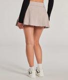 The It-Girl Attitude Drop Waist Pleated Skort is a trendy women's bottom in beige, designed with modern details and alluring textures to complete chic outfits for 2025.