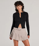 Get the look of a skirt and the comfort of shorts in the It-Girl Attitude Drop Waist Pleated Skort in beige, perfect for staying stylish while on the move this summer.