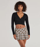 Create bold, fashion-forward looks for summer with the Plaid Charm Pleated Drop Waist Skort in gray, a must-have piece from Windsor’s collection of stylish bottoms for women.