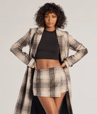 The Classic Charm Plaid Wrap Skort is a trendy women's bottom in gray, designed with modern details and alluring textures to complete chic outfits for 2025.
