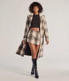 The Classic Charm Plaid Wrap Skort is a trendy women's bottom in gray, designed with modern details and alluring textures to complete chic outfits for 2025.