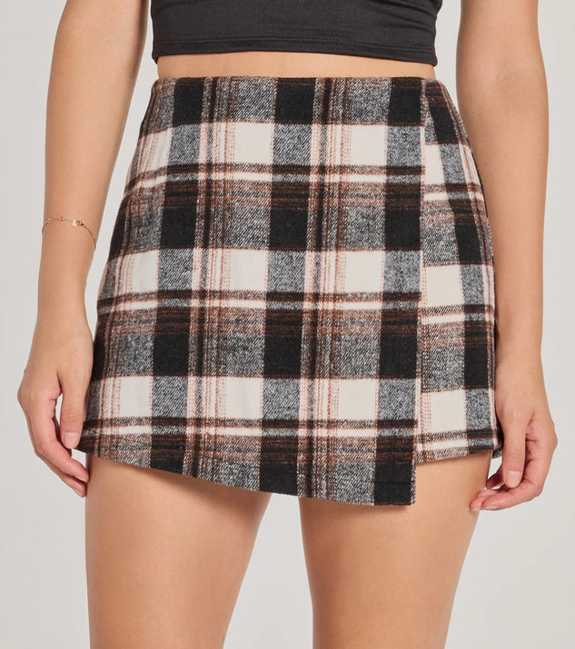 Create bold, fashion-forward looks for spring or summer with the Classically Chic Plaid High Waist Wrap Skort in black, a must-have piece from Windsor’s collection of stylish bottoms for women.