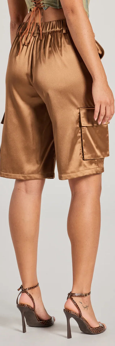 The Trendsetter Vibes Satin Cargo Jorts is a trendy women's bottom in brown, designed with modern details and alluring textures to complete chic outfits for 2025.
