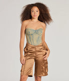 Create bold, fashion-forward looks for spring or summer with the Trendsetter Vibes Satin Cargo Jorts in brown, a must-have piece from Windsor’s collection of stylish bottoms for women.