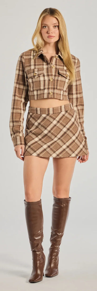 The Plaid Appeal A-Line Skort is a trendy women's bottom in brown, designed with modern details and alluring textures to complete chic outfits for 2025.