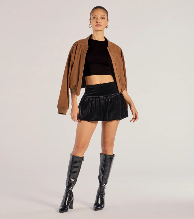 The Luxe Impression Velvet Bubble Skort in black is an elevated pick for your best outfit yet, effortlessly delivering a polished look that's sure to turn heads at any celebration.