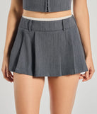 With a flirty cut and hidden shorts underneath, the Keep It Casual Pleated Mini Skort in ivory serves skirt vibes with zero wardrobe worries.