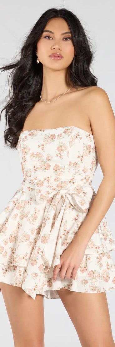 Pair the Cute Composure Tie-Waist Floral Ruffled Romper with your favorite sandals or sneakers for effortless fall outfits with on-trend natural rompers that speak your style.