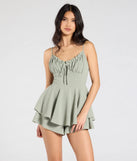 Create bold, fashion-forward looks for spring or summer with the Swept Away Tie-Back Ruffled Romper in sage green, a must-have piece from Windsor’s collection of stylish bottoms for women.