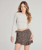 The Perfect Date Tie Waist Floral Ruffle Skort in black brings edge and energy to your vibe, ready to elevate any festival look or concert outfit.