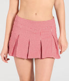 Create bold, fashion-forward looks for spring or summer with the Absolute Darling Gingham Pleated Skort in red, a must-have piece from Windsor’s collection of stylish bottoms for women.