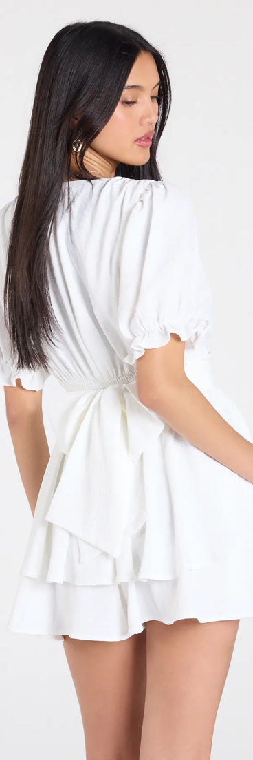 The Stay Sweet Short Sleeve Button Romper in ivory brings sleek style to any graduation outfit, from cap and gown to after-party.