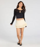 Create bold, fashion-forward looks for spring or summer with the Trendy Cutie Pleated A-Line Mini Skort in ivory, a must-have piece from Windsor’s collection of stylish bottoms for women.