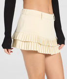Create bold, fashion-forward looks for spring or summer with the Trendy Cutie Pleated A-Line Mini Skort in ivory, a must-have piece from Windsor’s collection of stylish bottoms for women.