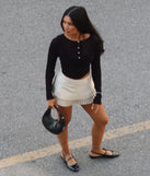 Create bold, fashion-forward looks for spring or summer with the Trendy Cutie Pleated A-Line Mini Skort in ivory, a must-have piece from Windsor’s collection of stylish bottoms for women.