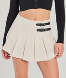 Create bold, fashion-forward looks for spring or summer with the Chic Mood Pleated Belted Skort in ivory, a must-have piece from Windsor’s collection of stylish bottoms for women.