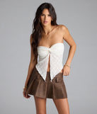 The Around The City Mid-Rise Pleated Skort in brown brings edge and energy to your vibe, ready to elevate any festival look or concert outfit.