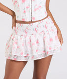 Create bold, fashion-forward looks for spring or summer with the Call Me Cutie Floral Eyelet Mini Skirt in white, a must-have piece from Windsor’s collection of stylish bottoms for women.