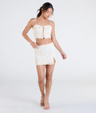 The Boho Muse Lace Embroidered Mini Skirt in natural brings edge and energy to your vibe, ready to elevate any festival look or concert outfit.