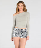 The In The Groove Sequin Hot Shorts in silver brings edge and energy to your vibe, ready to elevate any festival look or concert outfit.