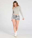 Create bold, fashion-forward looks for summer with the In The Groove Sequin Hot Shorts in silver, a must-have piece from Windsor’s collection of stylish bottoms for women.