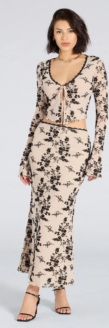 Serve effortless style and scroll-stopping energy in the Flirt Alert Flocked Floral Mesh Maxi Skirt, part of a ivory matching clothing set that does the work for you with bold, polished vibes from top to bottom.