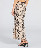 Create bold, fashion-forward looks for spring or summer with the Flirt Alert Flocked Floral Mesh Maxi Skirt in ivory, a must-have piece from Windsor’s collection of stylish bottoms for women.