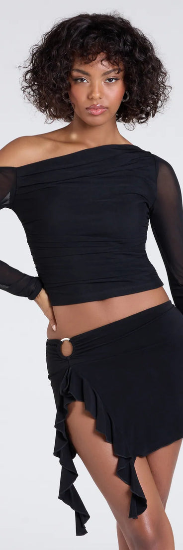 The Feeling Myself Slit Ruffle Mini Skirt in black brings edge and energy to your vibe, ready to elevate any festival look or concert outfit.