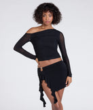 The Feeling Myself Slit Ruffle Mini Skirt in black brings edge and energy to your vibe, ready to elevate any festival look or concert outfit.
