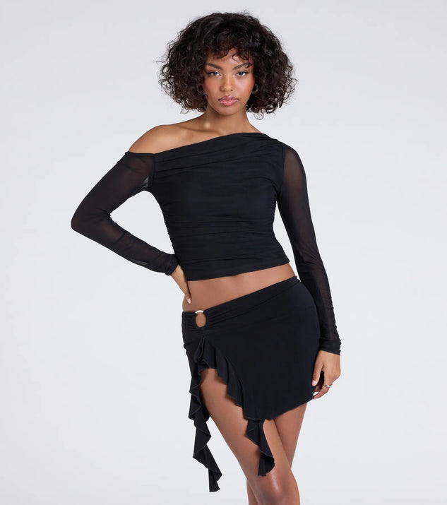 The Feeling Myself Slit Ruffle Mini Skirt in black brings edge and energy to your vibe, ready to elevate any festival look or concert outfit.