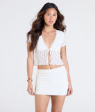 Create bold, fashion-forward looks for spring or summer with the Breezy Vibes Lace Mini Skirt in ivory, a must-have piece from Windsor’s collection of stylish bottoms for women.