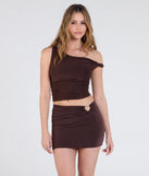 Create bold, fashion-forward looks for summer with the Cutie At Heart Cutout Mini Skirt in brown, a must-have piece from Windsor’s collection of stylish bottoms for women.