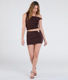 Create bold, fashion-forward looks for summer with the Cutie At Heart Cutout Mini Skirt in brown, a must-have piece from Windsor’s collection of stylish bottoms for women.