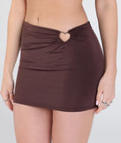 Create bold, fashion-forward looks for summer with the Cutie At Heart Cutout Mini Skirt in brown, a must-have piece from Windsor’s collection of stylish bottoms for women.