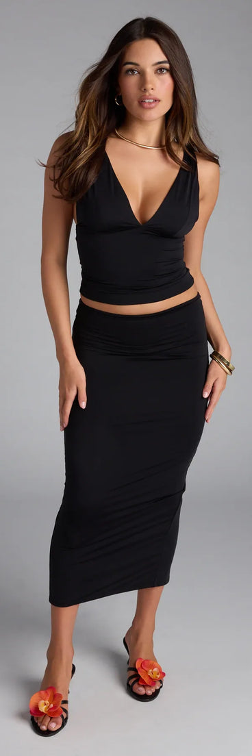 Look instantly put-together in the Serenade Me Bodycon Midi Skirt, part of a matching black clothing set designed for chic, no-fuss fall outfits.