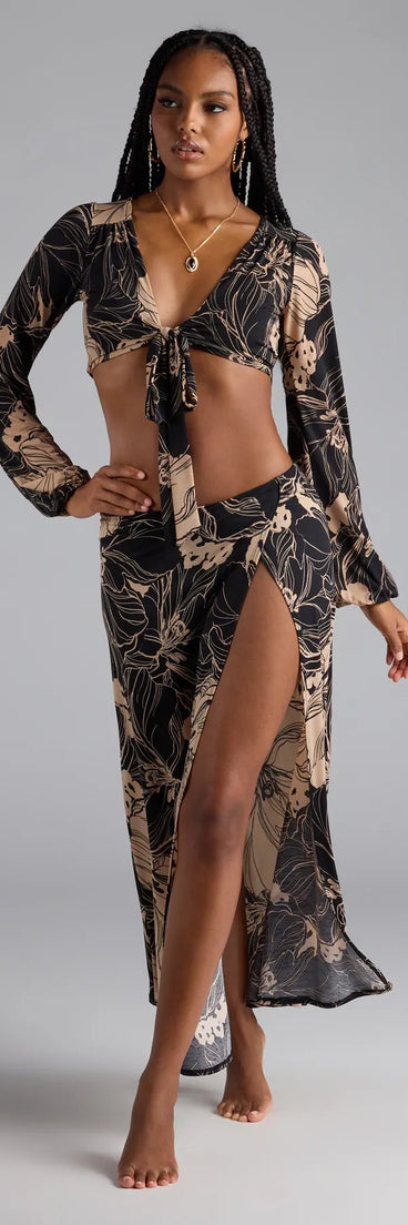 Serve effortless style and scroll-stopping energy in the Under The Sun Tropical Slit Maxi Skirt, part of a black matching clothing set that does the work for you with bold, polished vibes from top to bottom.