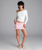 Choosing the pink skirt says you’re ready to show off in the Good Days Ruffle Mini Skirt, a warm-weather staple that elevates your outfit and seasonal style.