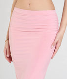 Pair the Sensational Match Bodycon Midi Skirt with your favorite crop or bodysuit for effortless warm-weather looks with on-trend blush skirts that speak your style.