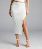 Choosing the ivory skirt says you’re ready to show off in the Flirty Ways Ruched High Slit Midi Skirt, a warm-weather staple that elevates your outfit and seasonal style.