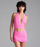 Choosing the pink skirt says you’re ready to show off in the Total Doll Ruffle Mini Skirt, a warm-weather staple that elevates your outfit and seasonal style.