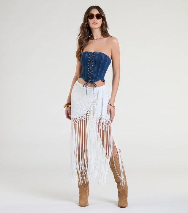 The Iconic Getaway Tie-Waist Wrap Fringe Skirt in ivory brings edge and energy to your vibe, ready to elevate any festival look or concert outfit.