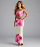 Complete your summer wardrobe with the Sandy Shores Tropical Floral Maxi Skirt, a trendy skirt in yellow made to mix, match, and stand out.