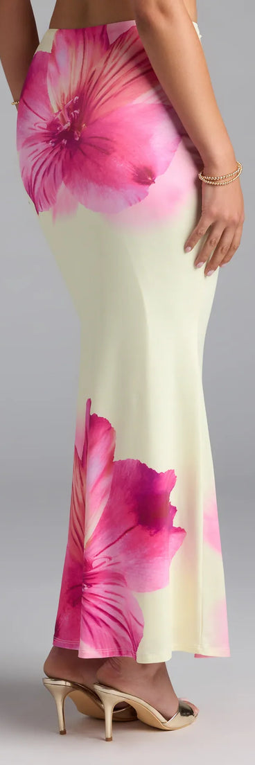 Complete your summer wardrobe with the Sandy Shores Tropical Floral Maxi Skirt, a trendy skirt in yellow made to mix, match, and stand out.