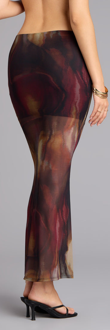 Style your day-to-night fall looks effortlessly in this skirt featuring the Night Out Muse Abstract Print Mesh Maxi Skirt.